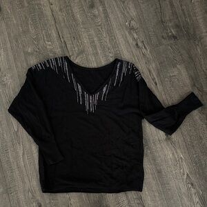 Vince Camuto Black 2 way Top with Silver Detailing.